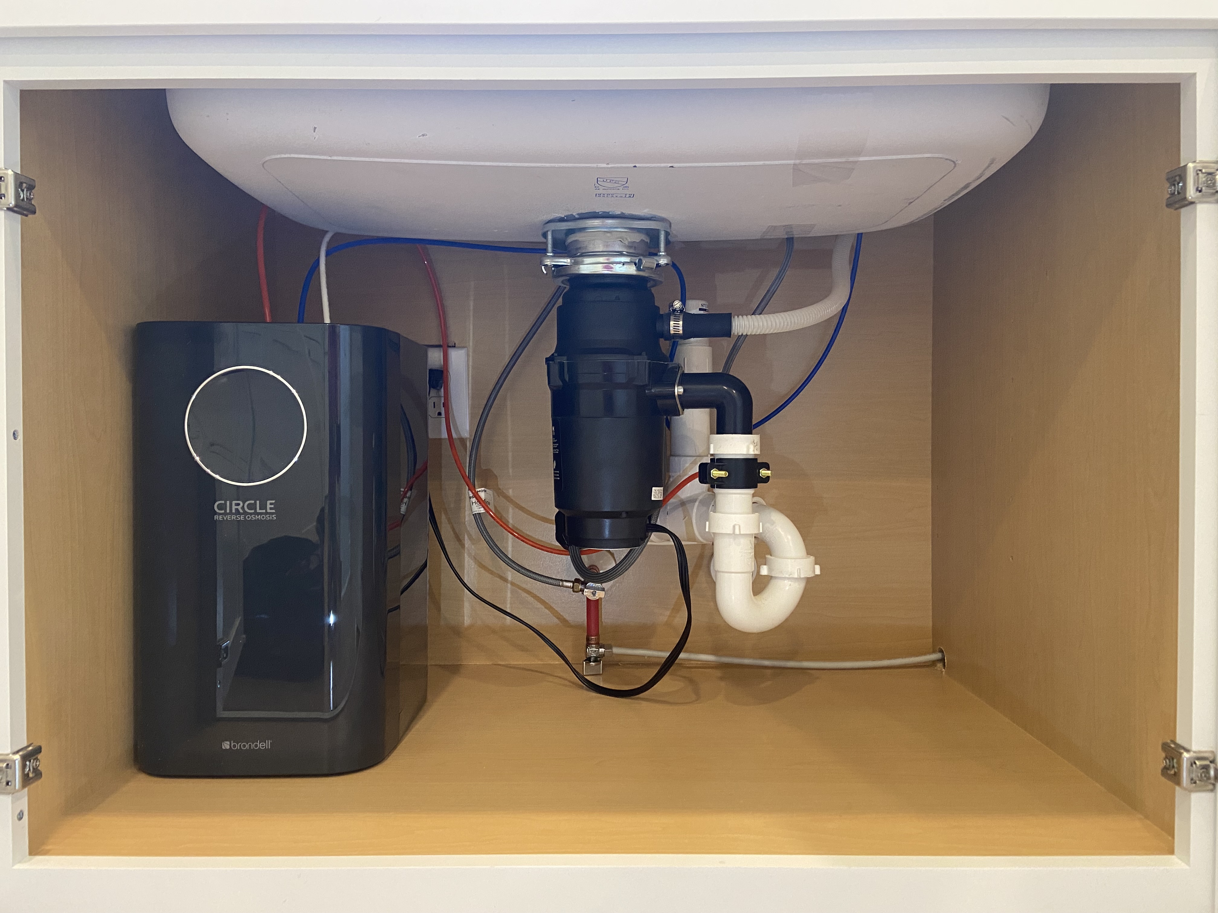 Under-sink water purification system installed by His Handy Hands in Raleigh NC